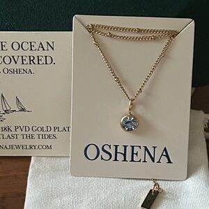 Oshena designer beachwear Gold Necklace with Blue gemstone Pendant